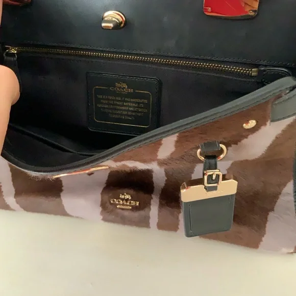 Coach,calf hair and leather top handle
Bag - Picture 5 of 14